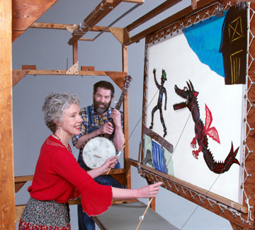 Jack runs from the Dragon - Deb Chase, shadow puppeteer / Mick Doherty, musician - Photo by Leo Arfer